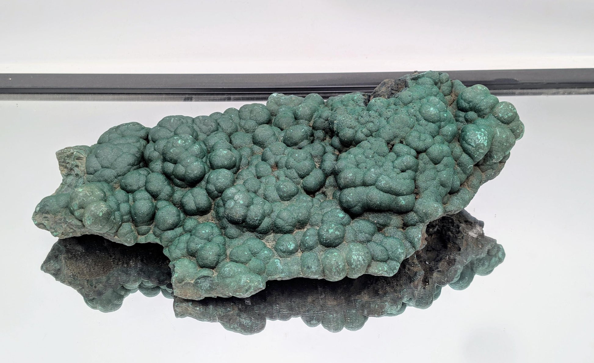 Decorative malachite piece with sparkling quartz druzy.