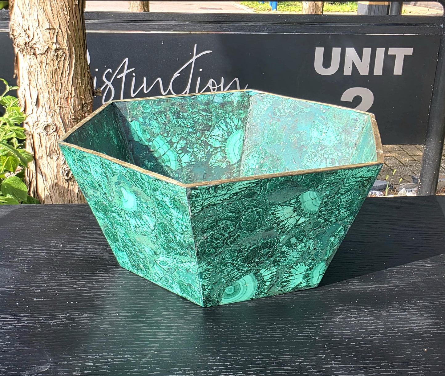 Elegant malachite flower pot made from genuine crystal slices, a statement piece for refined interiors.