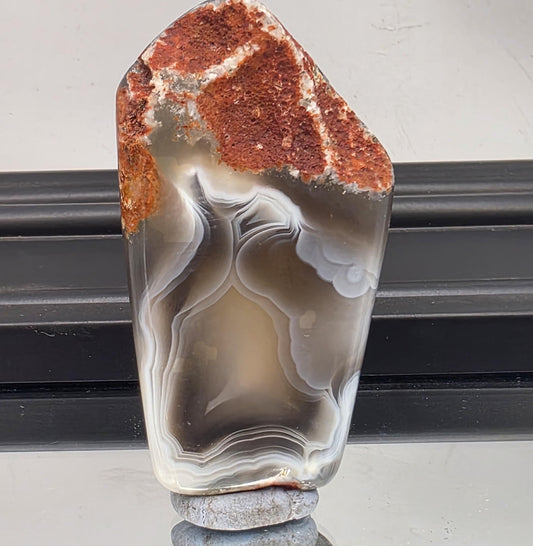Banded Malawi agate with rich natural lines.