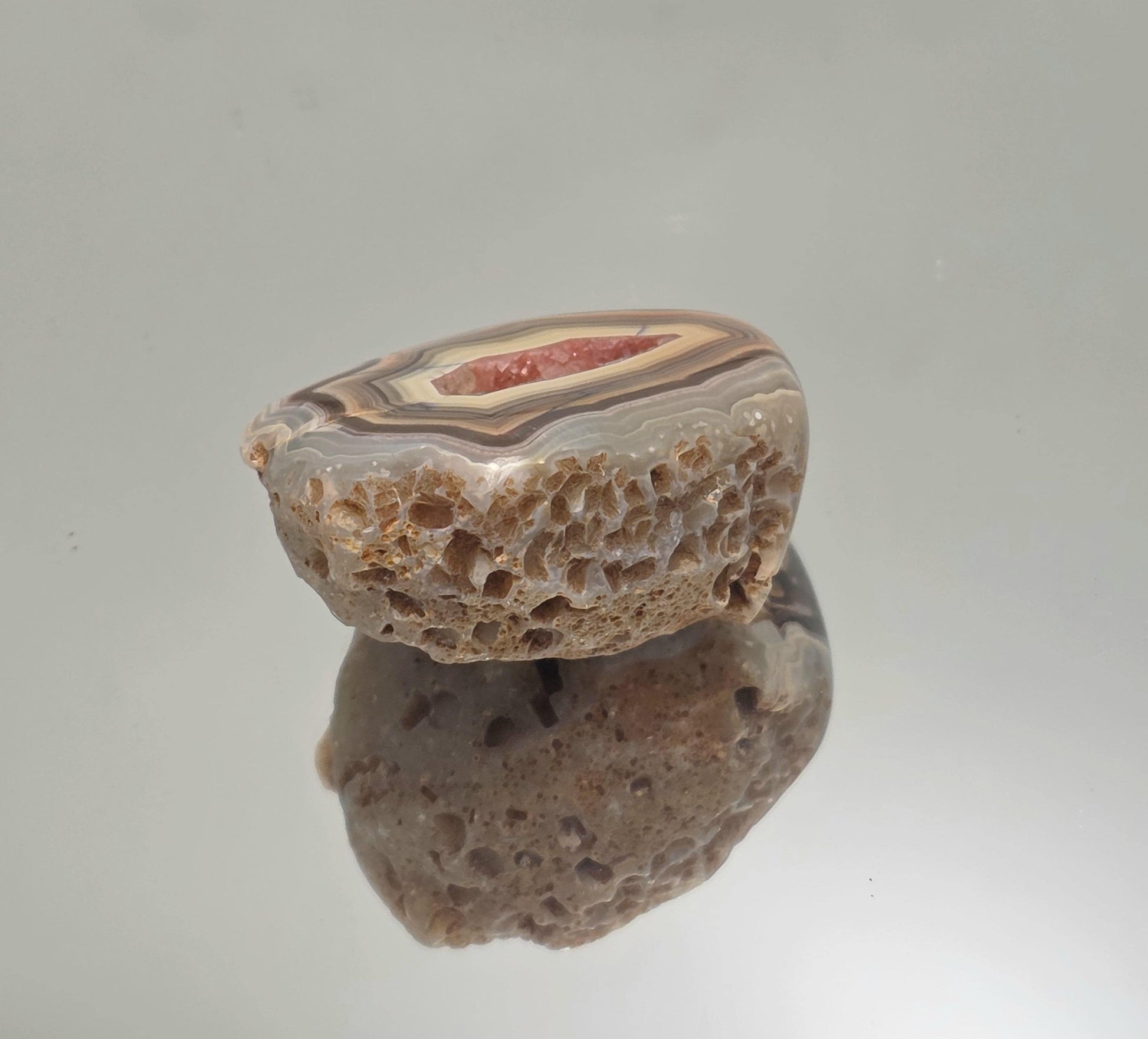 Malawi Agate polished geode pair with banded detail.