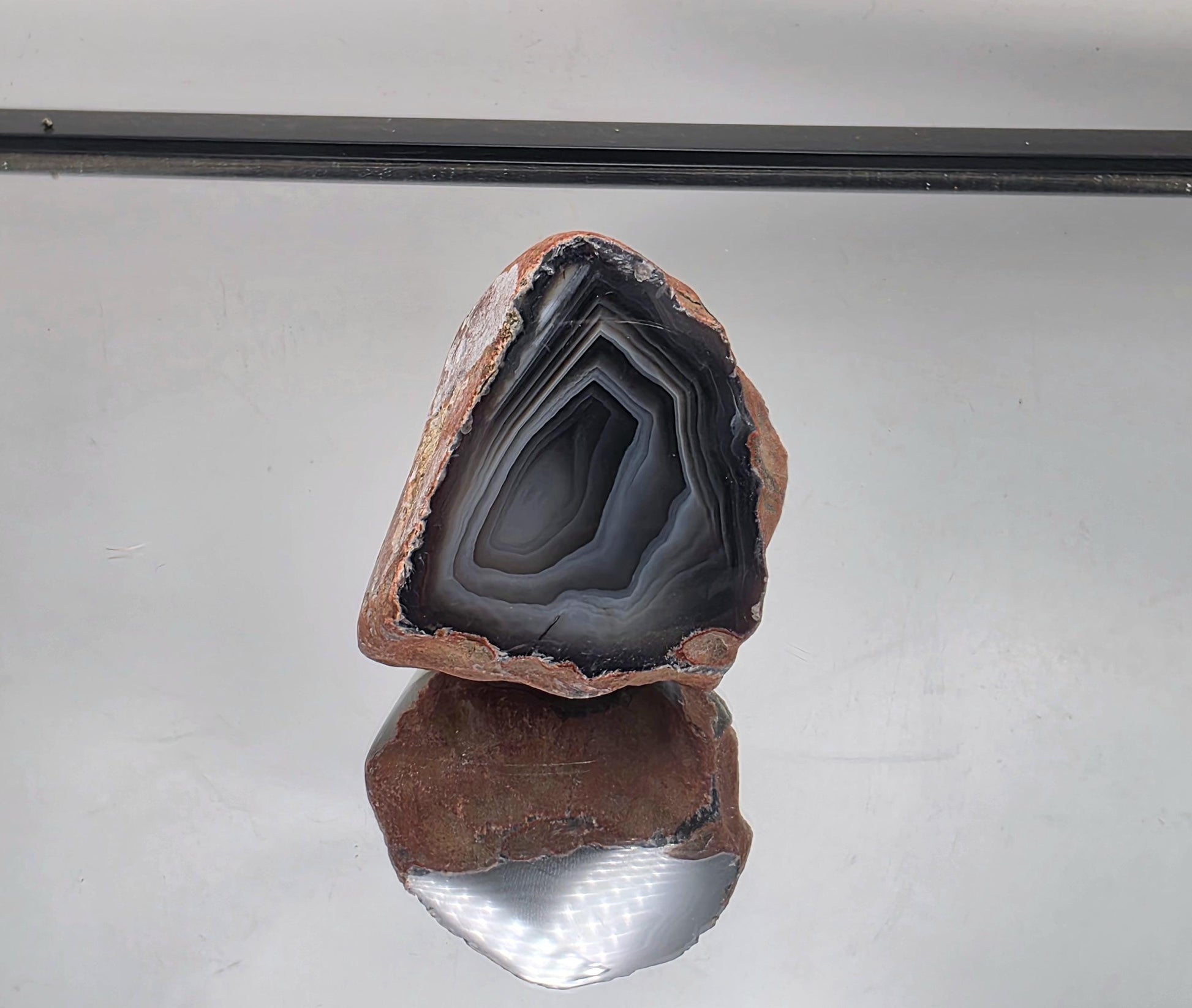 A polished Malawi Agate Crystal, ideal for cabinet display.