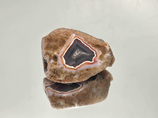 Extra large Malawi Agate geode with polished face.