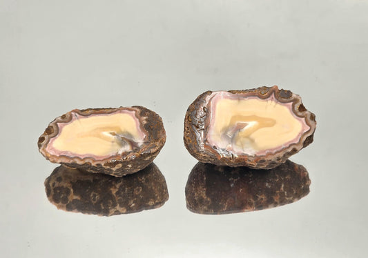 Malawi Agate geode pair with polished faces.