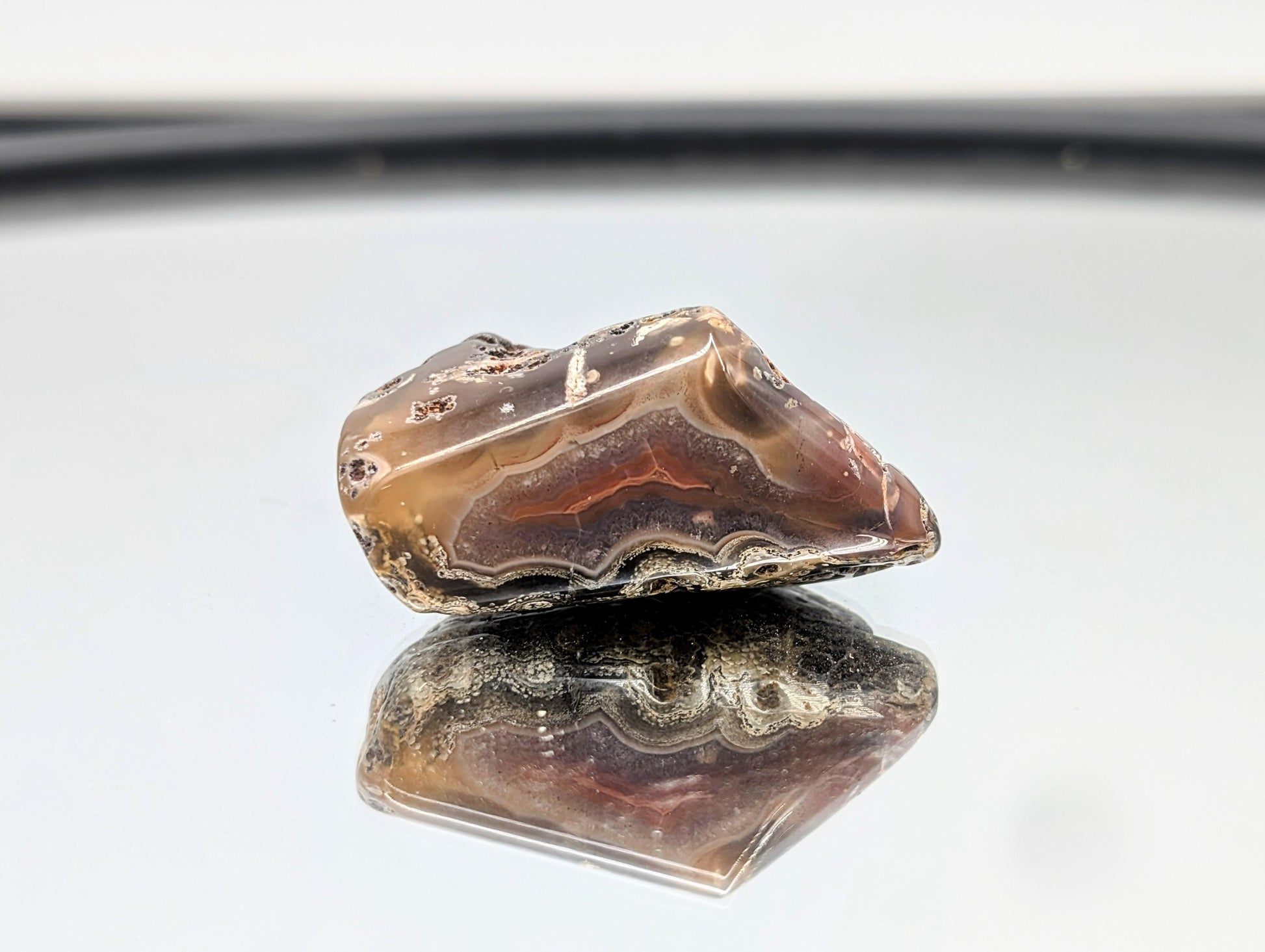 Shiny polished Malawi Agate stone with unique coloration.