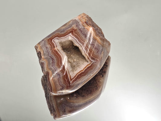 Malawi Agate polished slice crystal with natural banding.