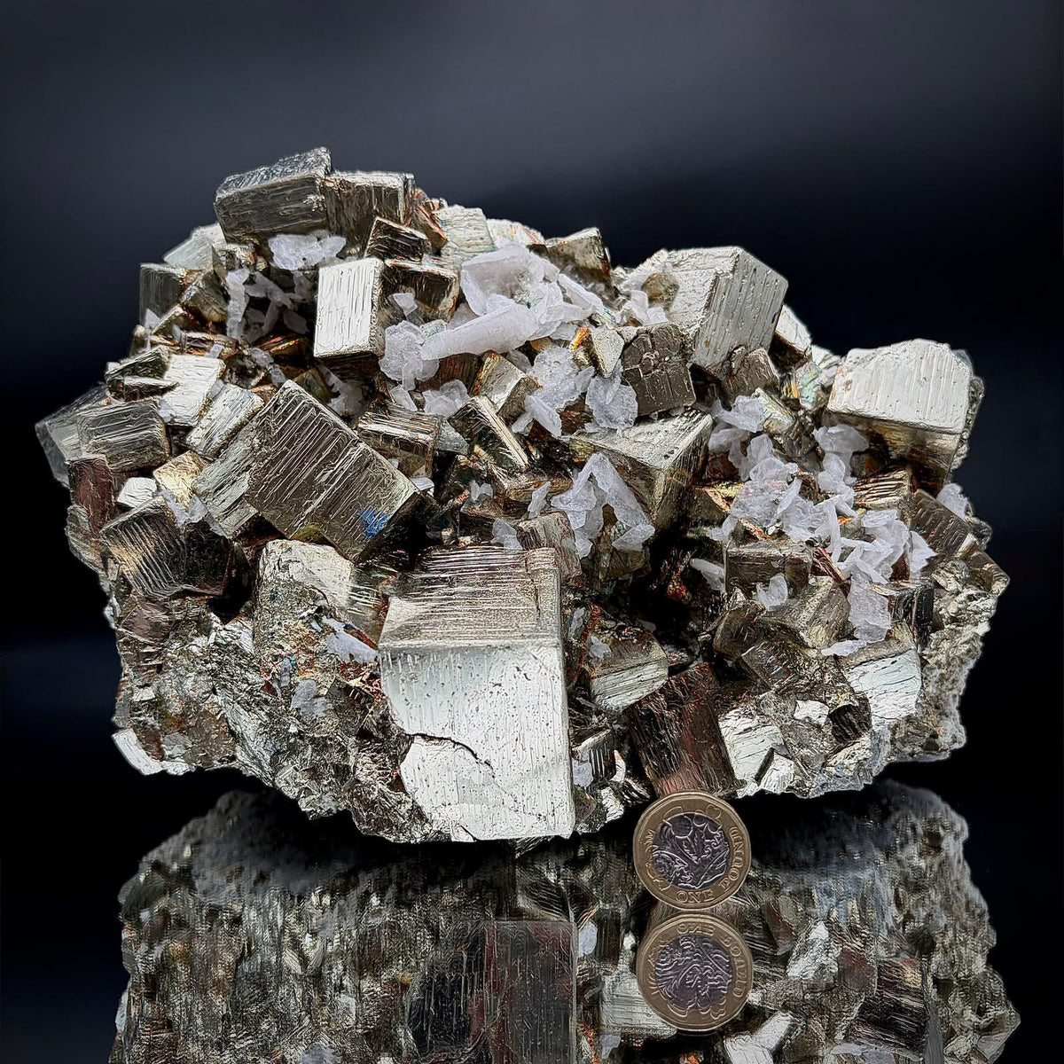 Mangano Calcite growing with Cubic Pyrite crystals