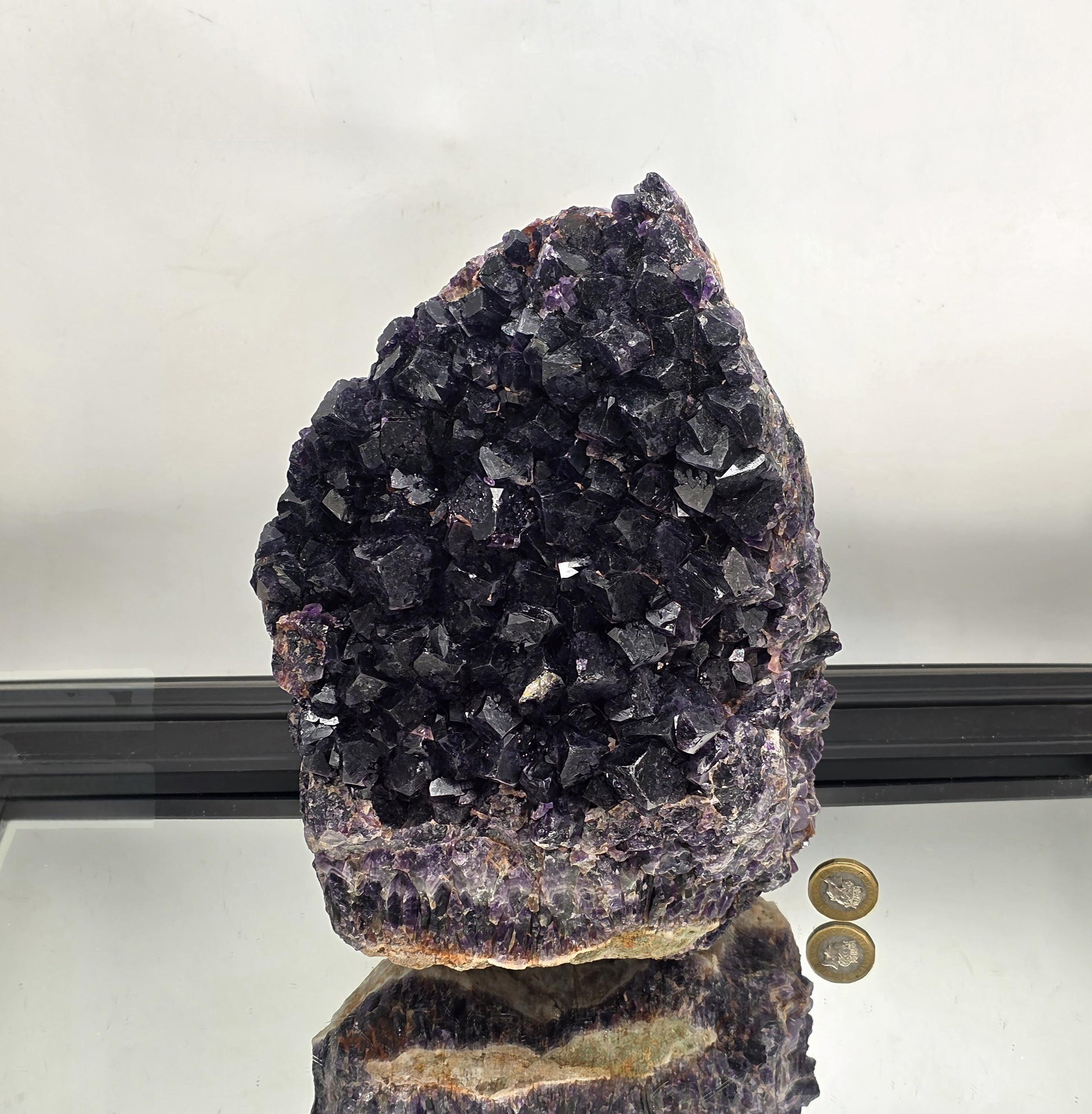 XL Mapatizya amethyst cluster from Zambia with deep purple crystal points.
