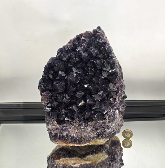 XL Mapatizya amethyst cluster from Zambia with deep purple crystal points.