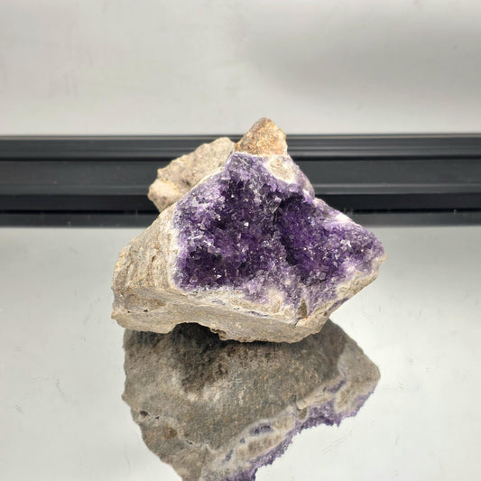 Dark violet Mapatizya amethyst cluster from Zambia.