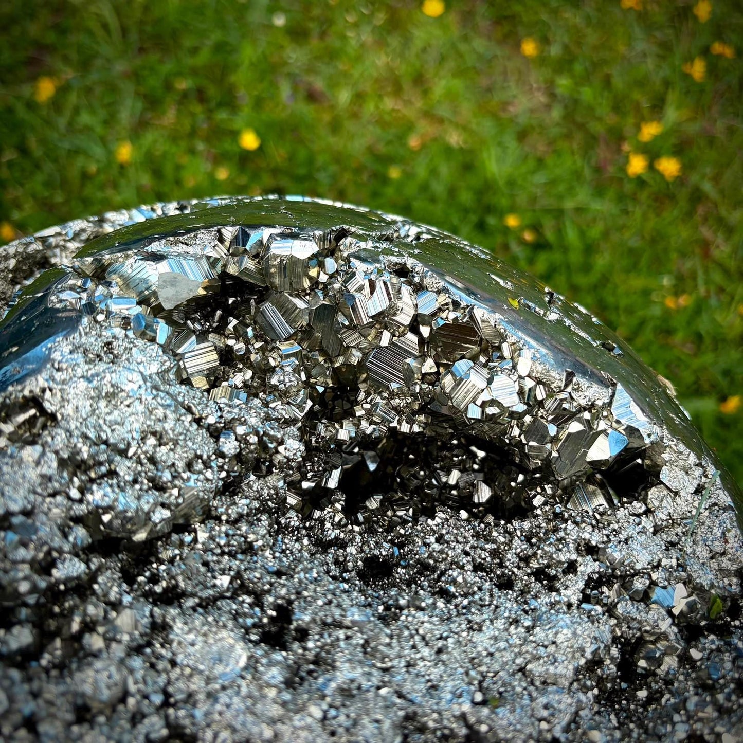 Metallic Peruvian Pyrite sphere with polished finish for a luxury mineral collection.