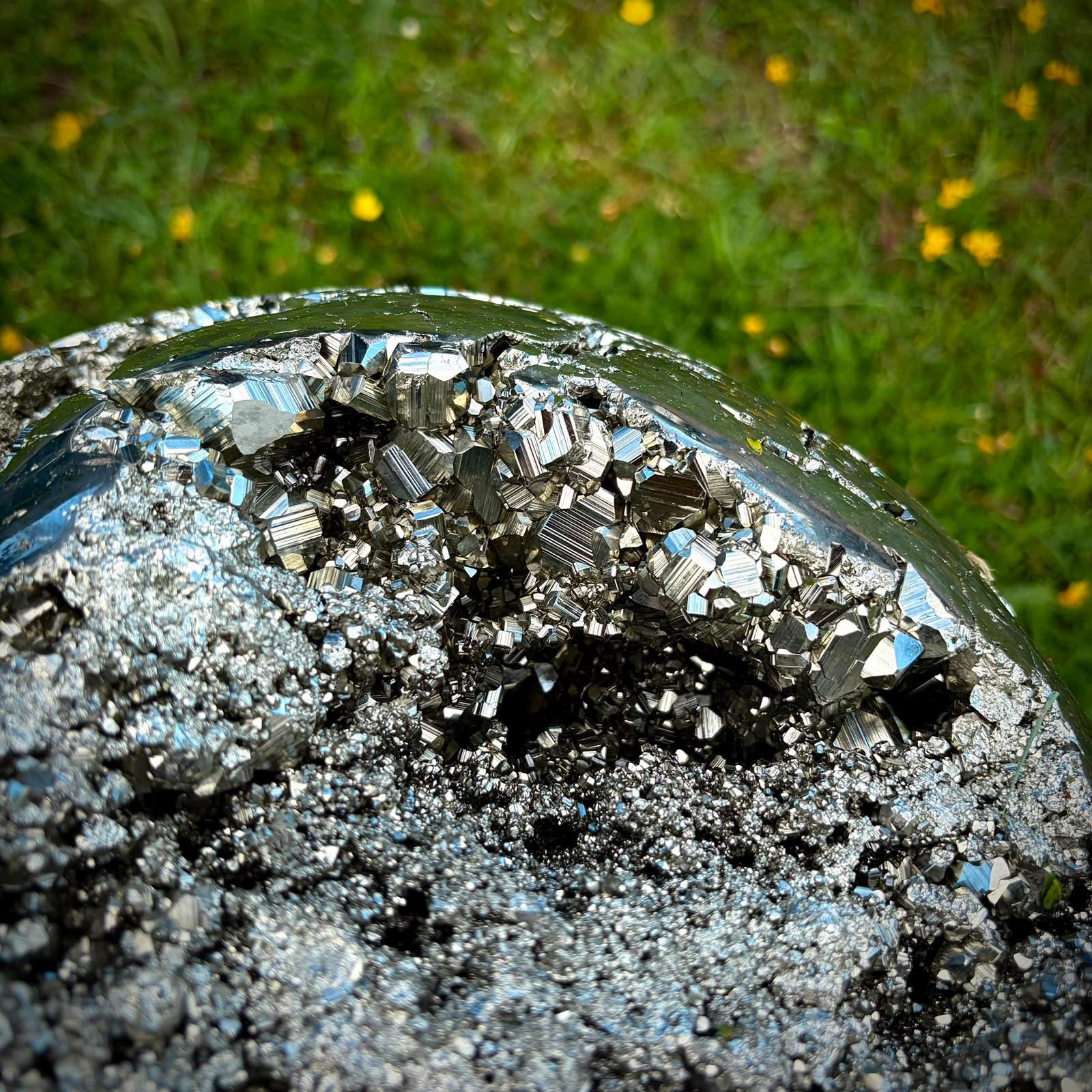 Metallic Peruvian Pyrite sphere with polished finish for a luxury mineral collection.