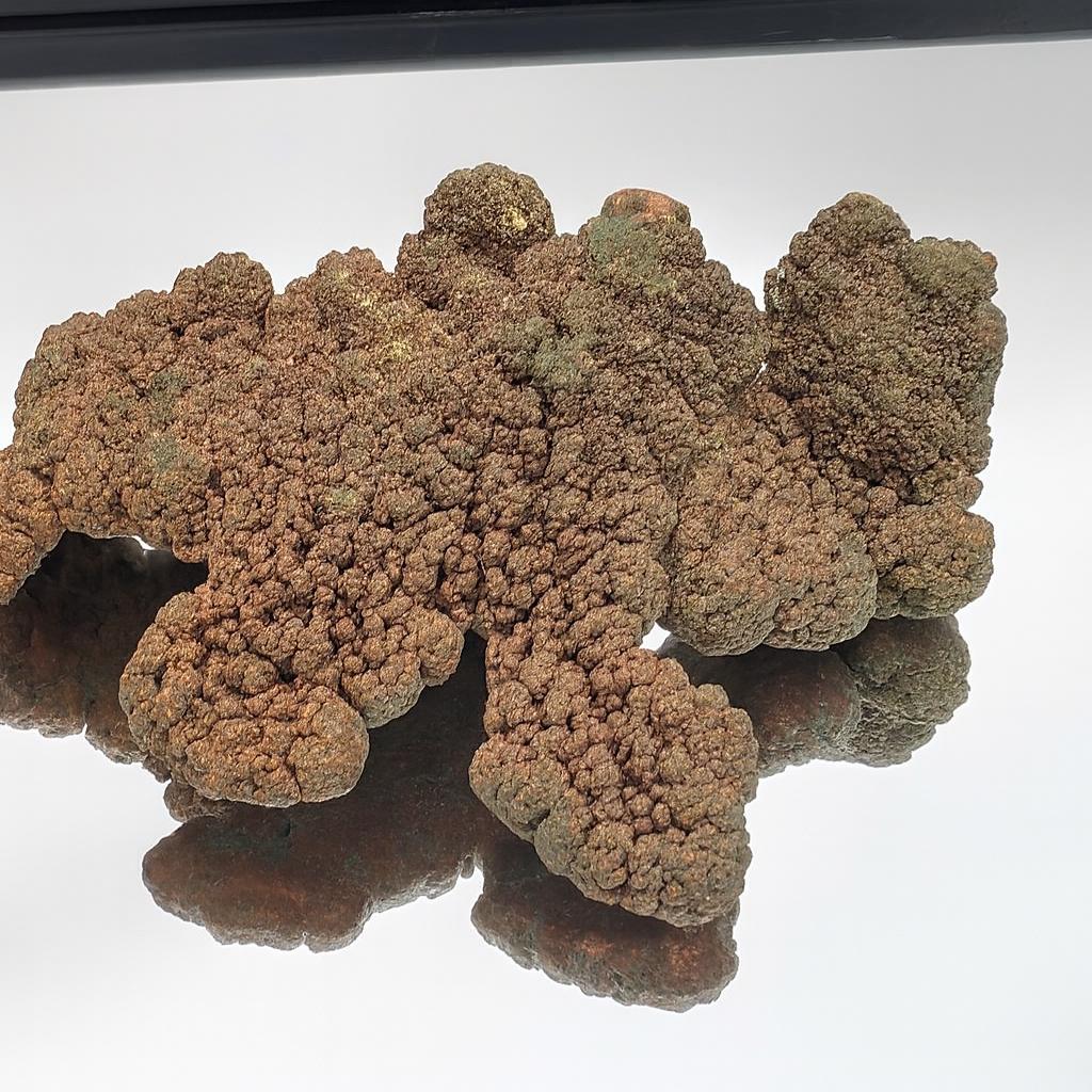 Raw metallic copper crystal nugget, natural formation with striking texture.
