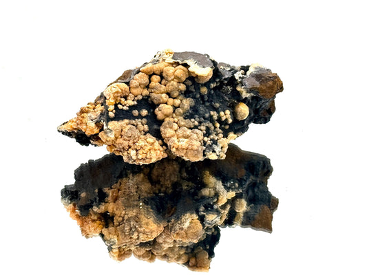 Mimetite crystal specimen on pyrolusite mineral matrix