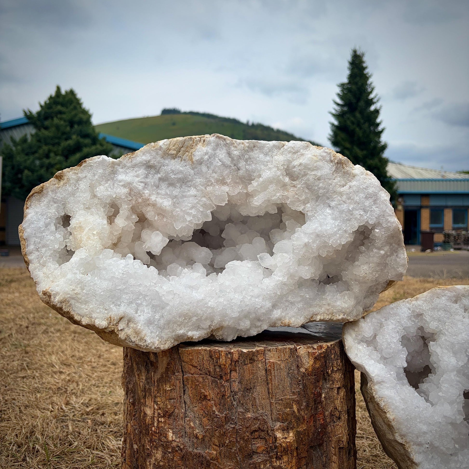Open Moroccan quartz crystal geode pair revealing naturally formed quartz crystals.