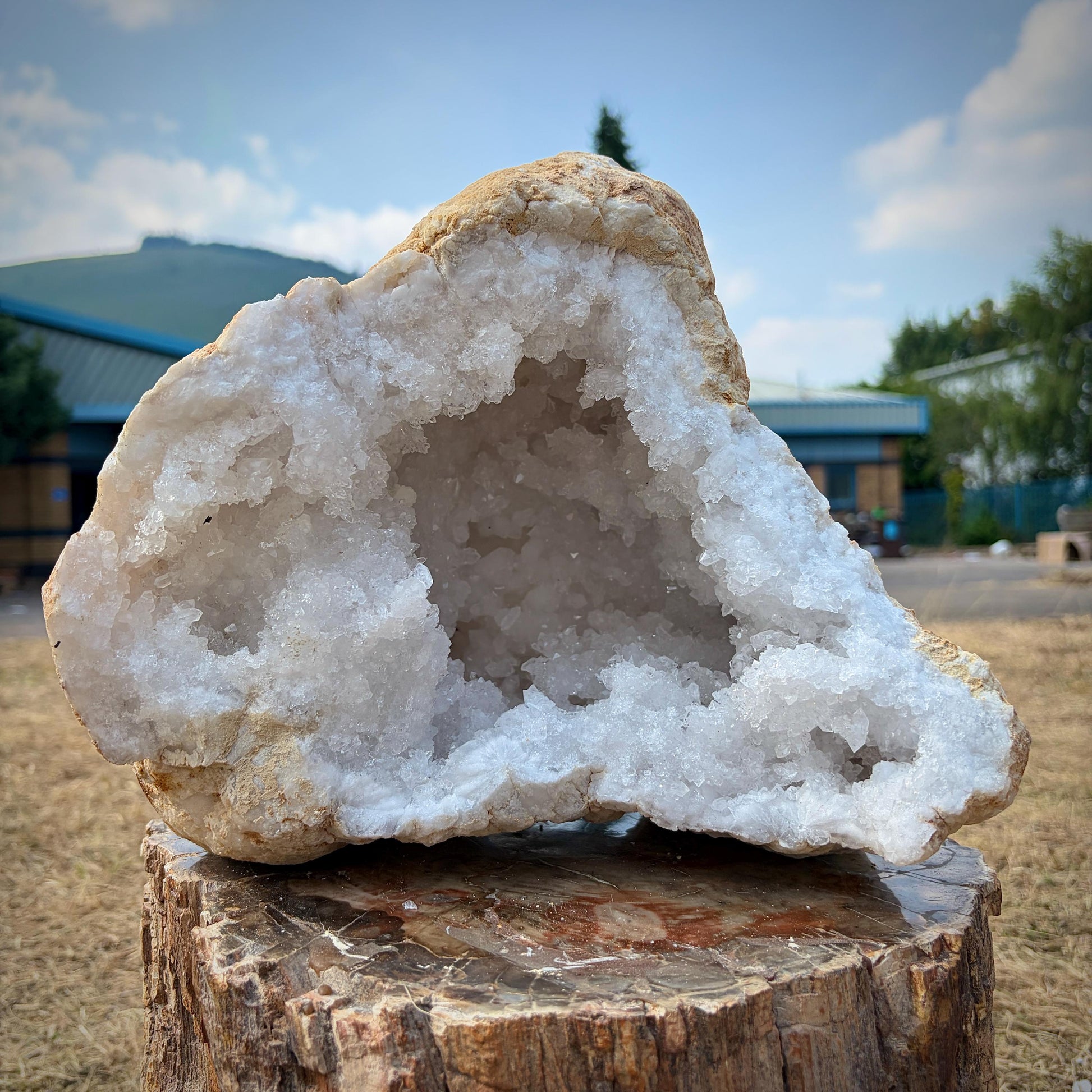 Natural Moroccan quartz crystals inside a large split geode.