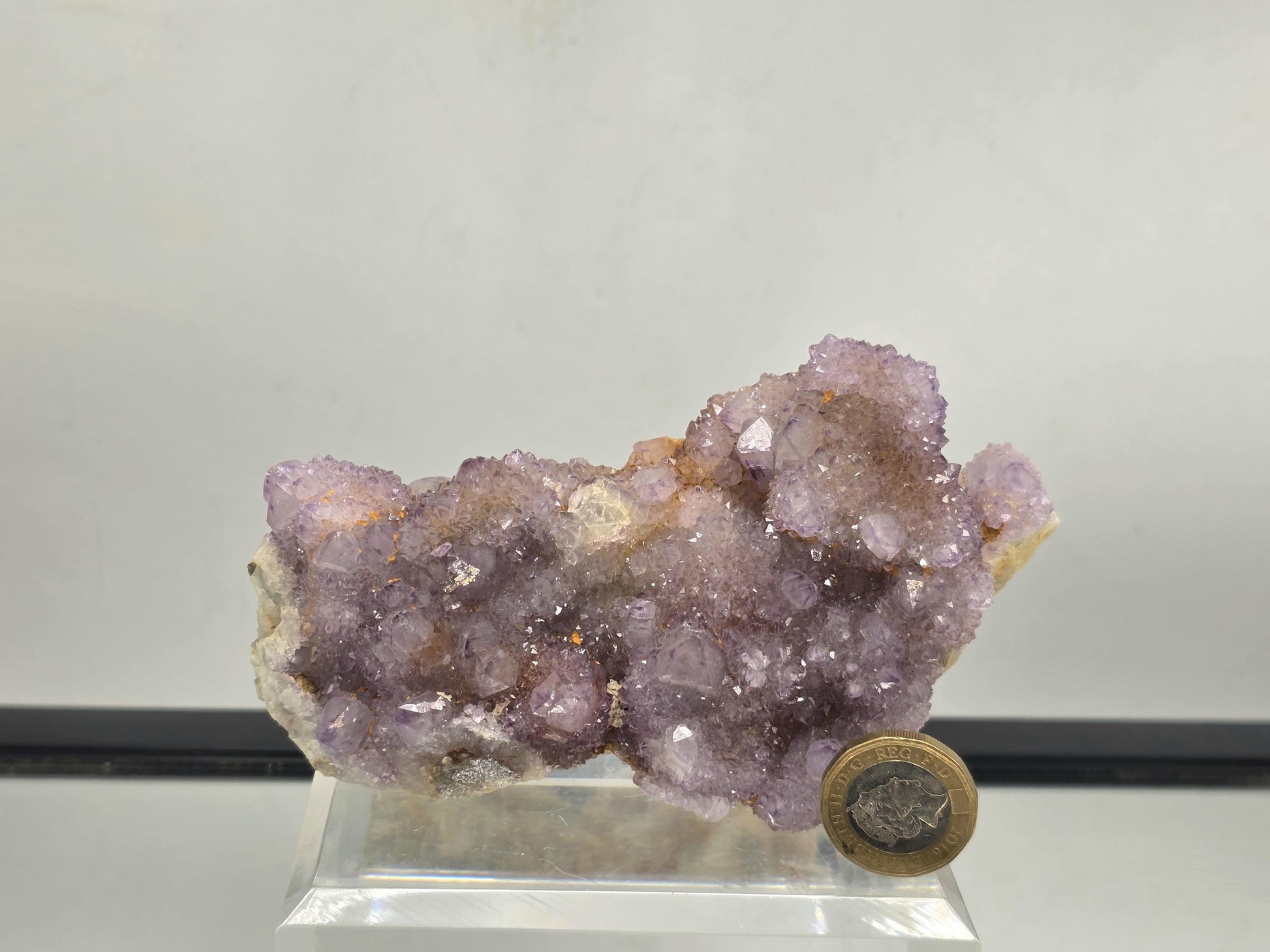 Natural purple Amethyst crystal cluster.