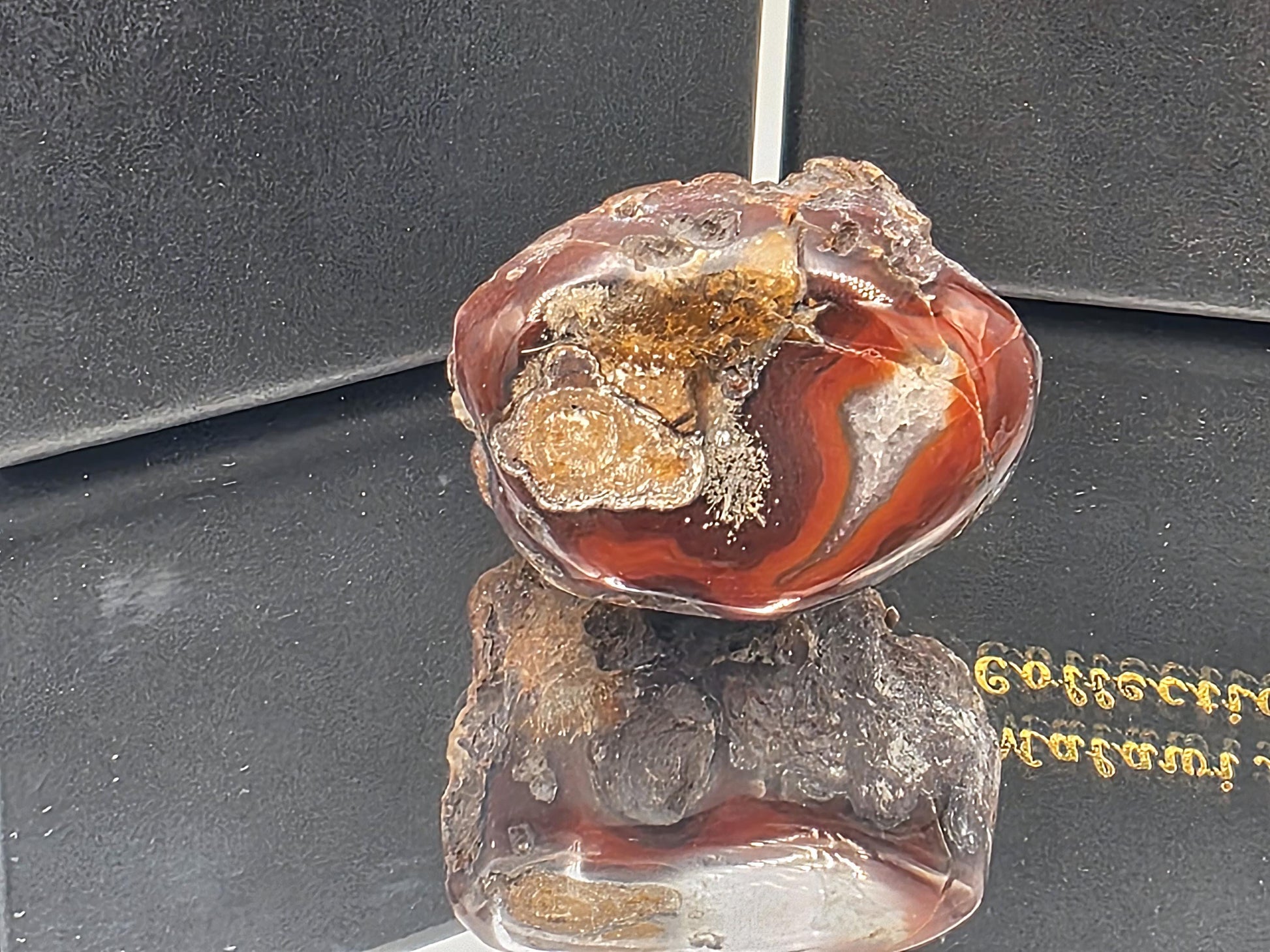 Beautifully banded natural agate from Malawi, showcasing unique swirls and earthy tones.