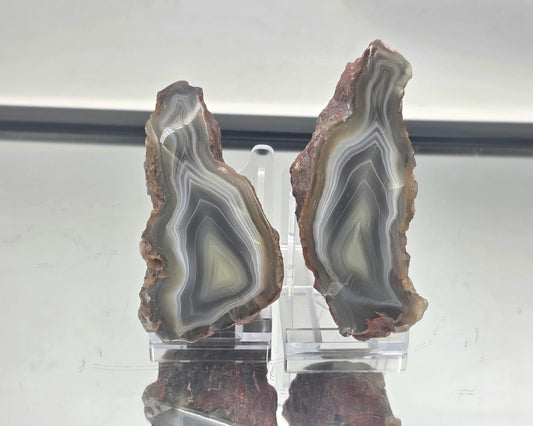 Natural banded black and grey polished agate crystal pair