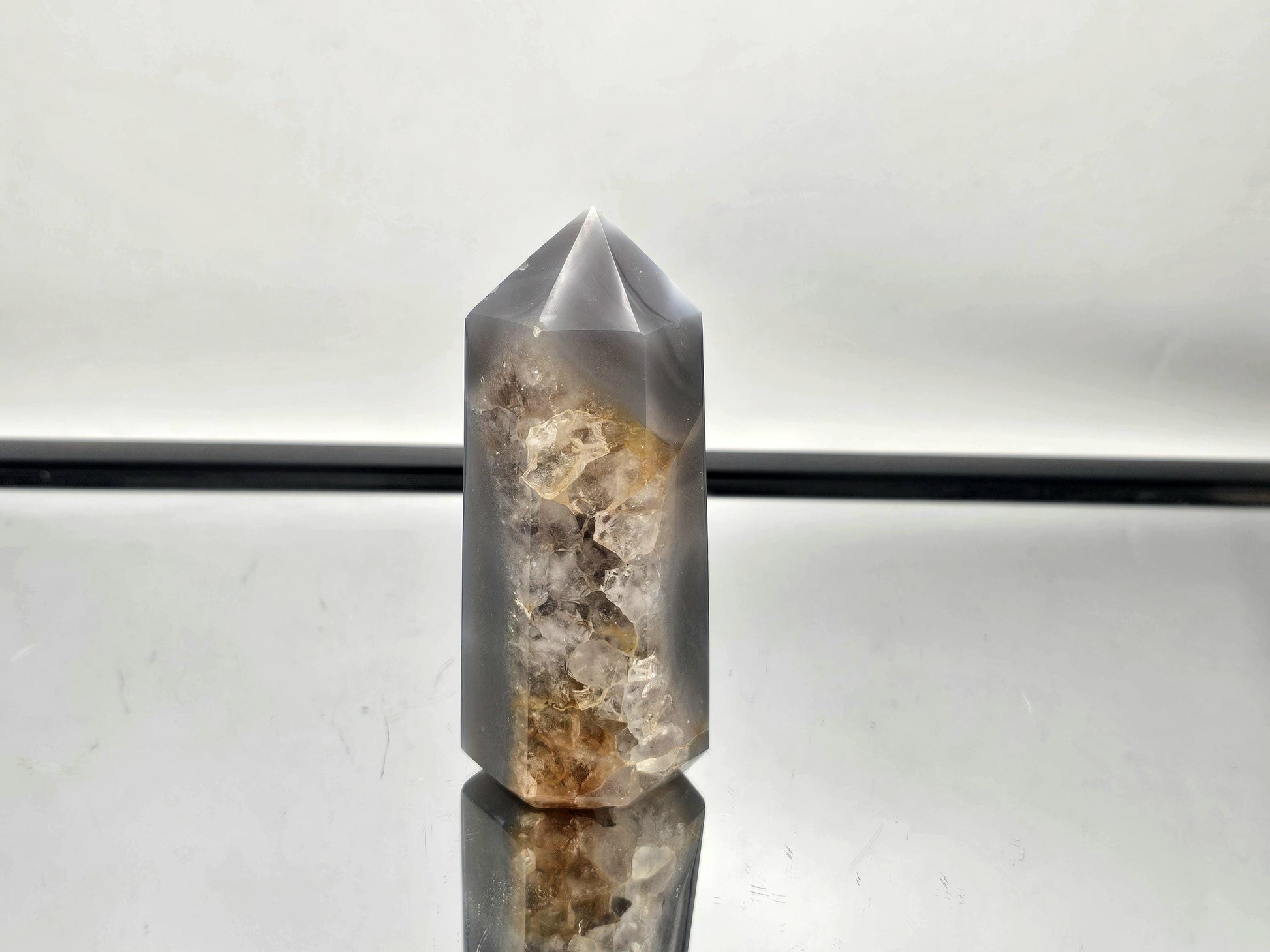Natural blue Orca Agate crystal point for healing.