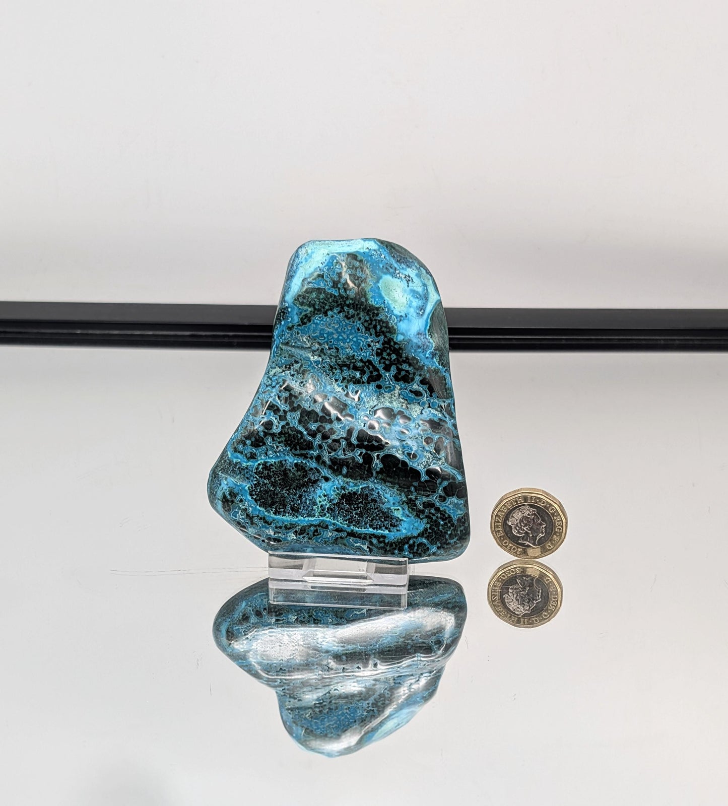 Organic swirls of blue and green in polished stone.