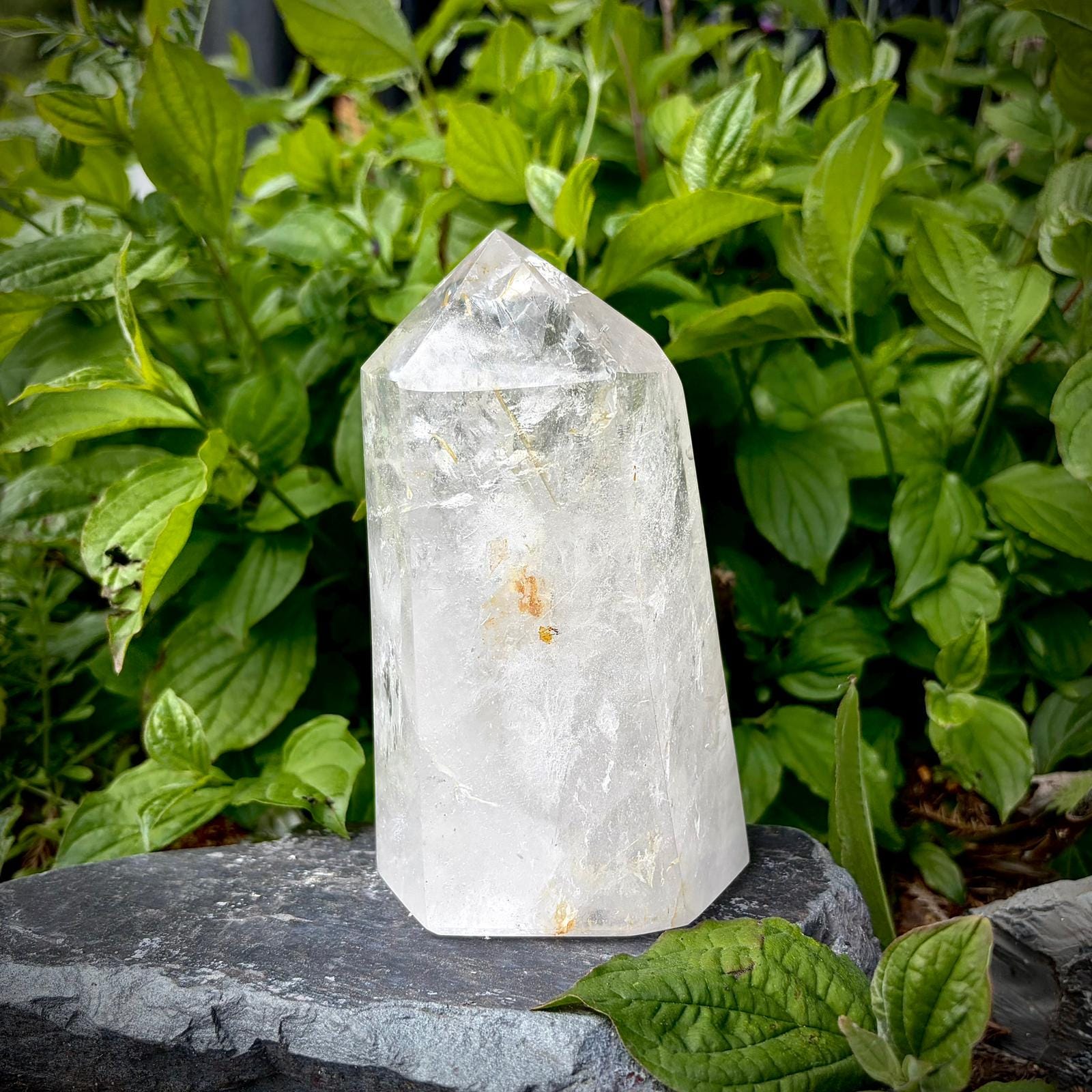 Natural clear quartz tower decor piece with polished finish and refined prism shape.