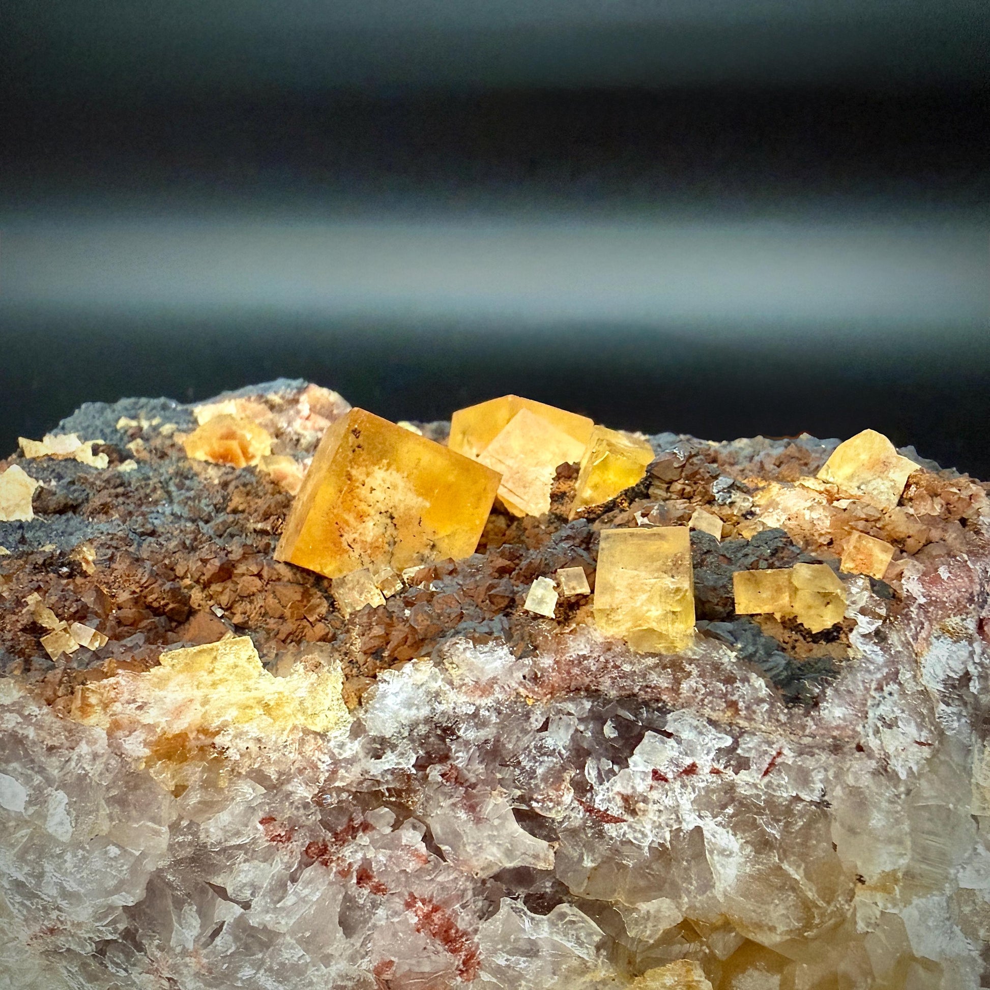 Bright Golden Fluorite with natural crystal formation.