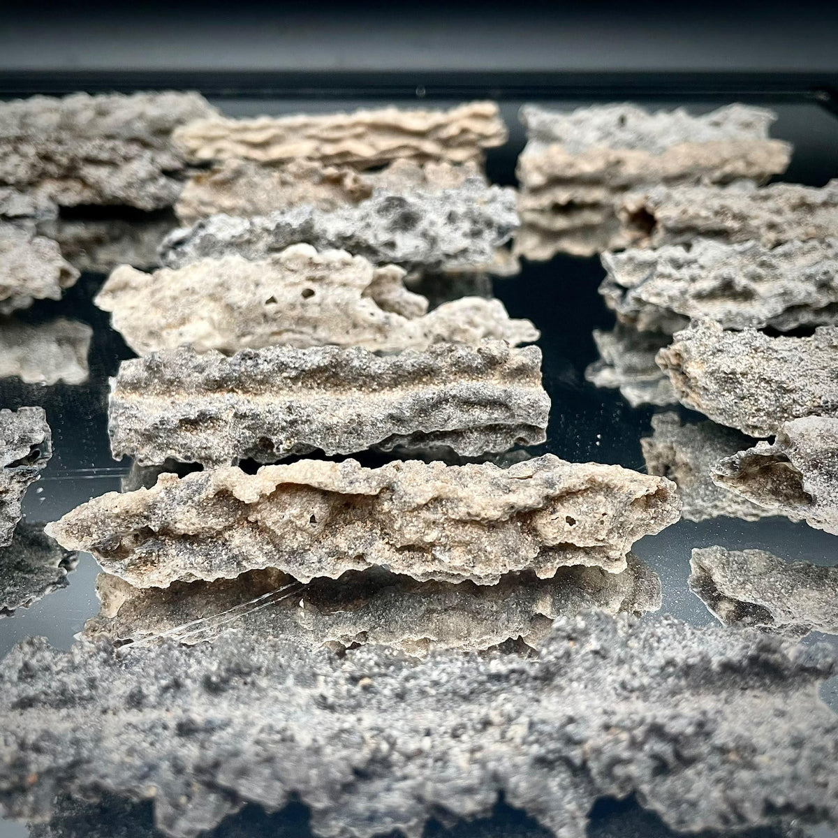Natural Fulgurite Lightning Glass specimen from the Libyan Desert, approximately 8–10cm, formed by lightning striking sandy ground.
 Copy alt text