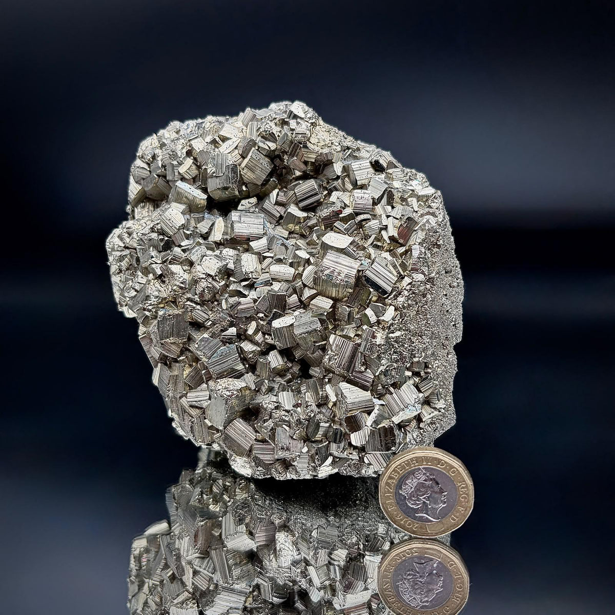 Natural iron sulphide mineral specimen featuring Pyrite crystals.