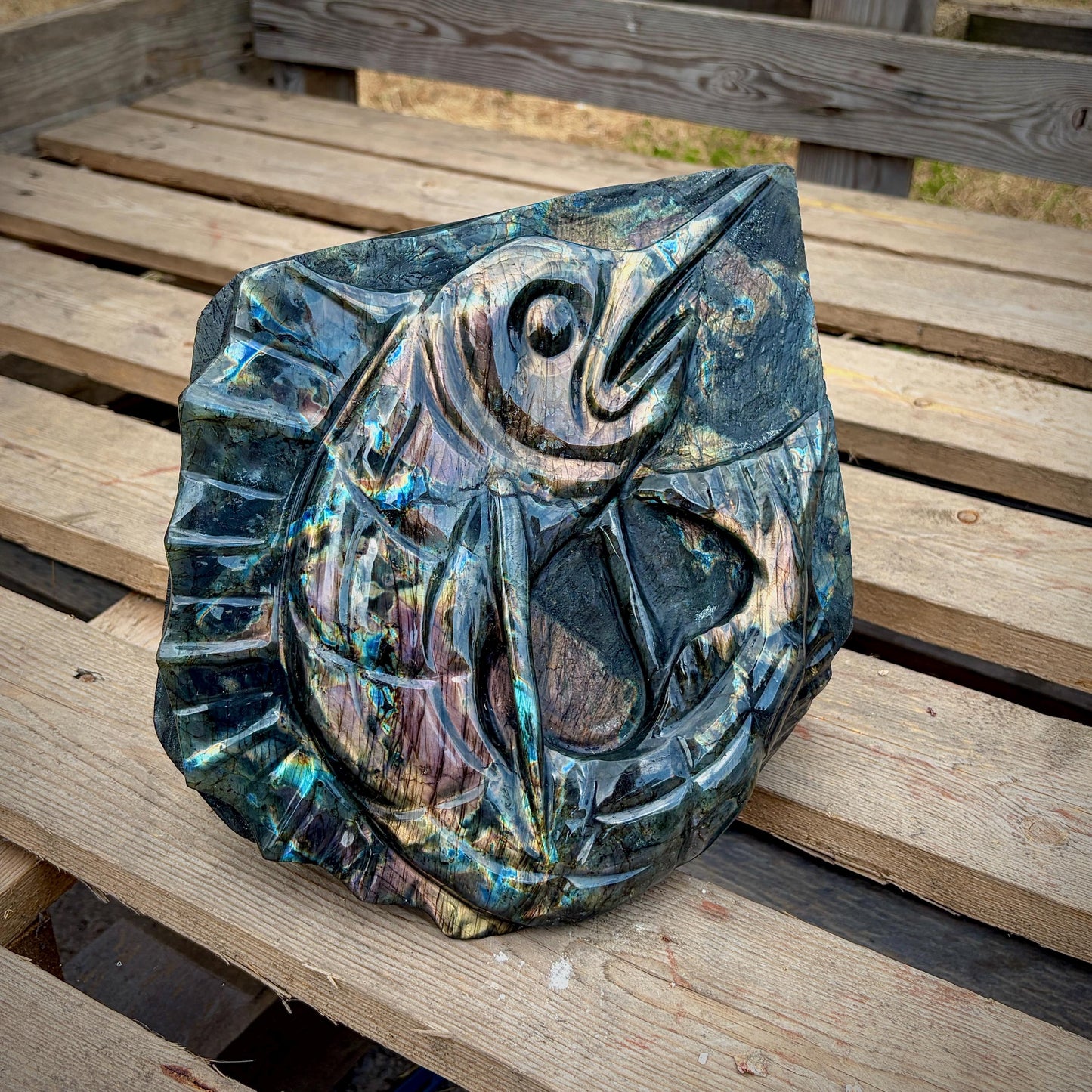 One-of-a-kind Labradorite fish sculpture chosen by Distinction Crystals