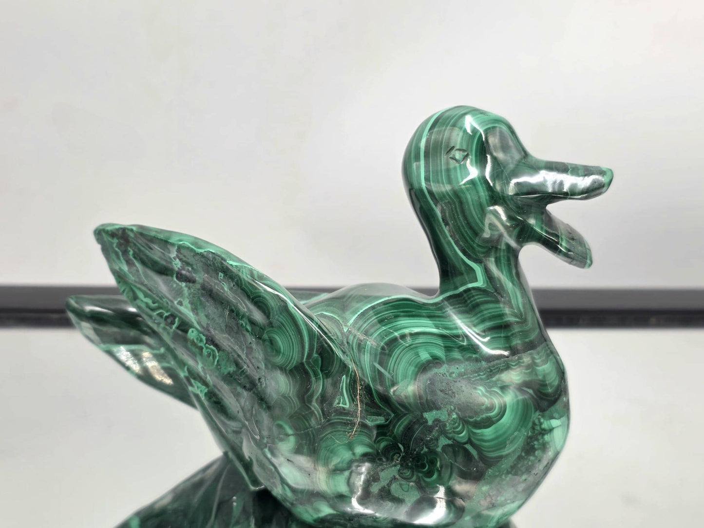 Polished malachite duck carving for home décor