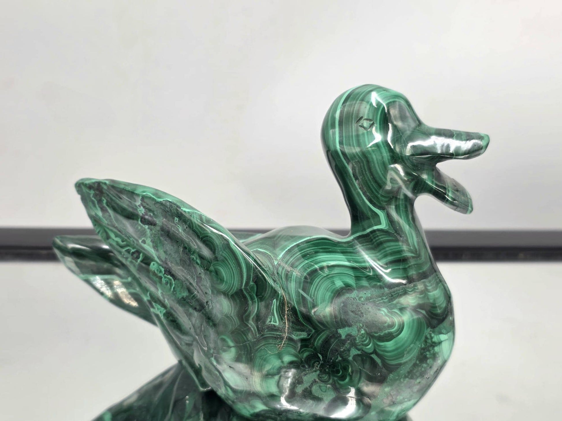Polished malachite duck carving for home décor