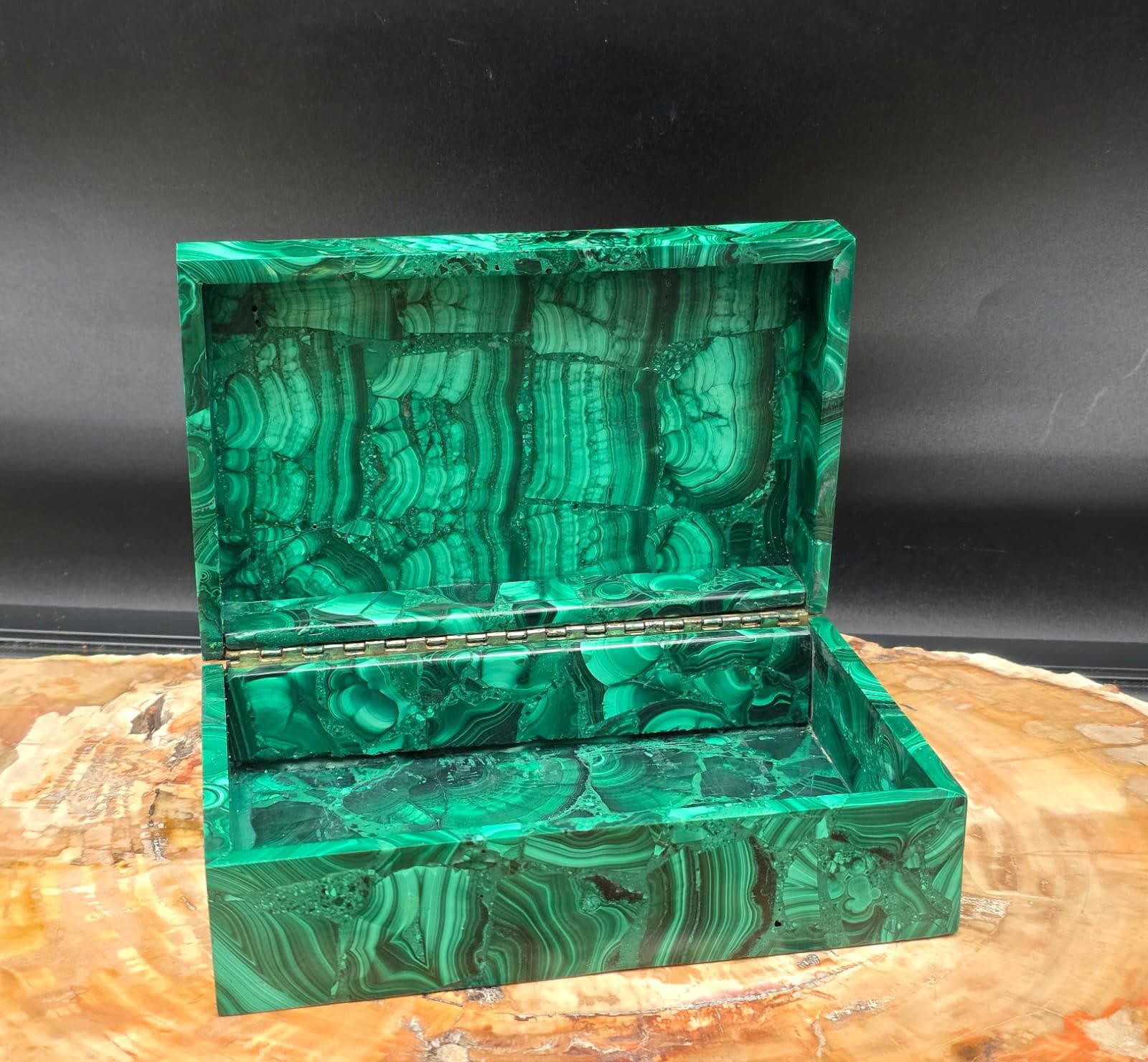 Polished Malachite crystal box displayed as an elegant home décor accessory.