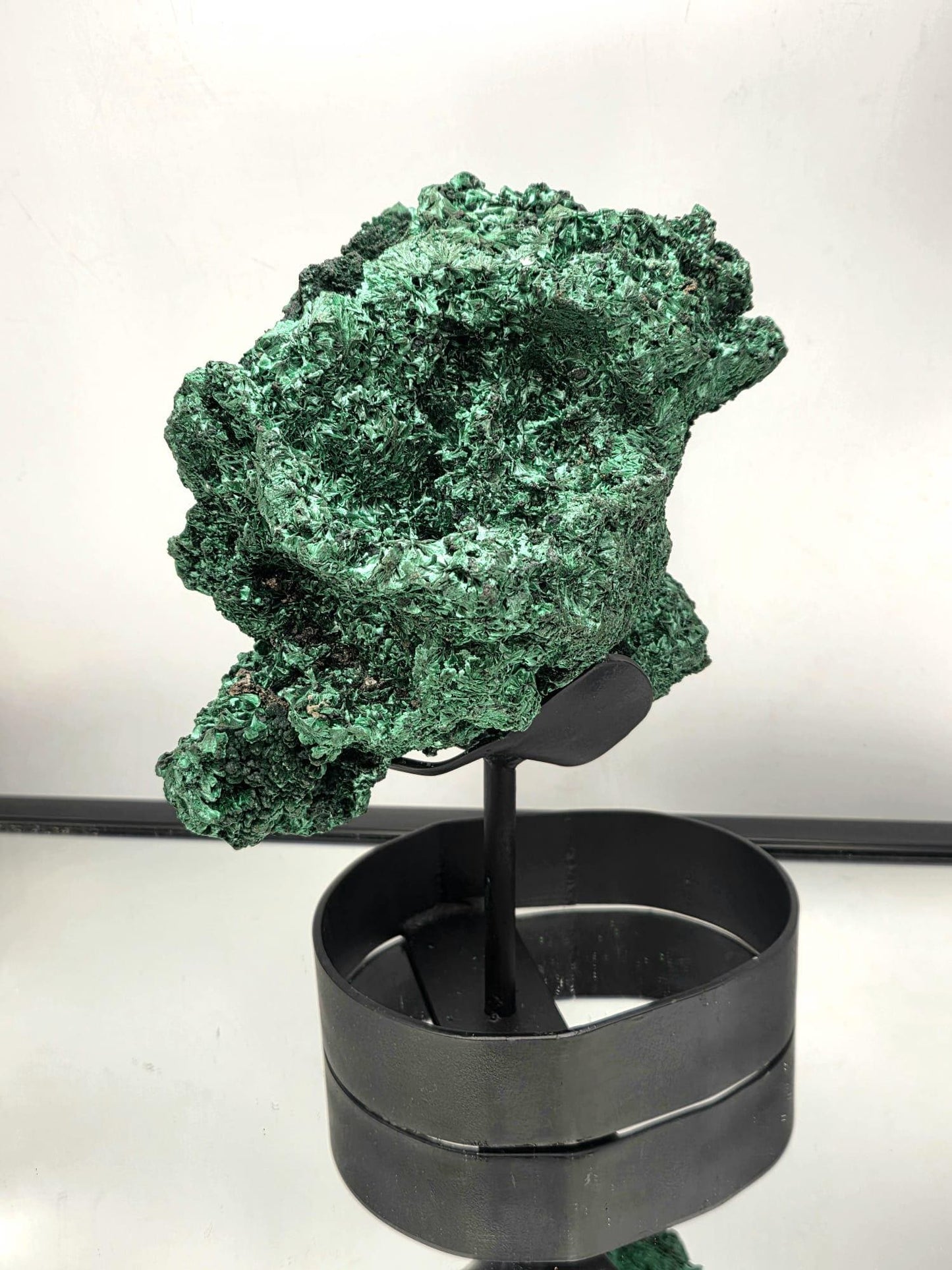 Natural Malachite skull carving with vivid floral form