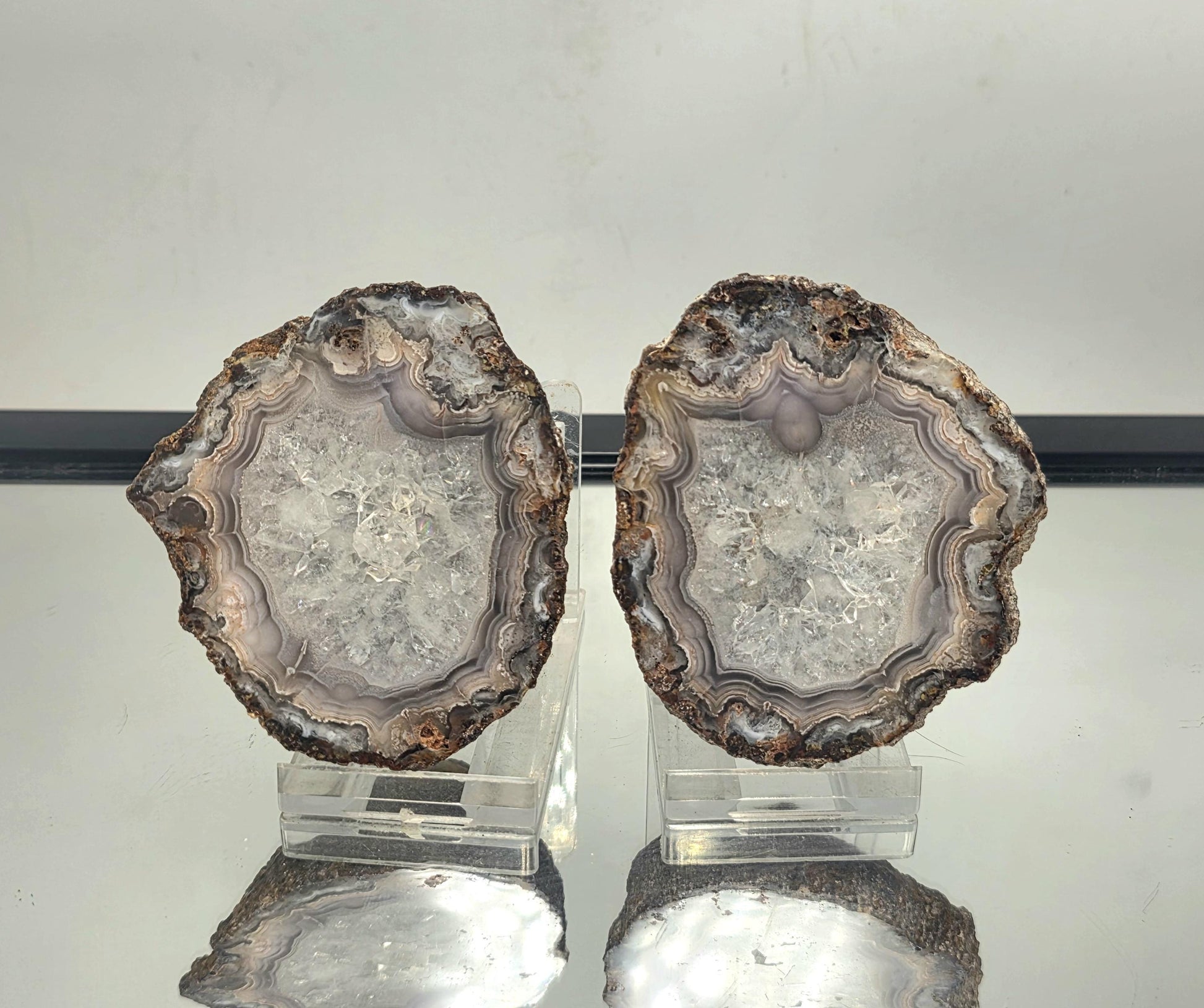 Natural Mexican Agate pair with polished edges and bold banding.