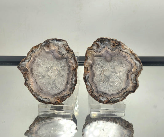 Natural Mexican Agate pair with polished edges and bold banding.