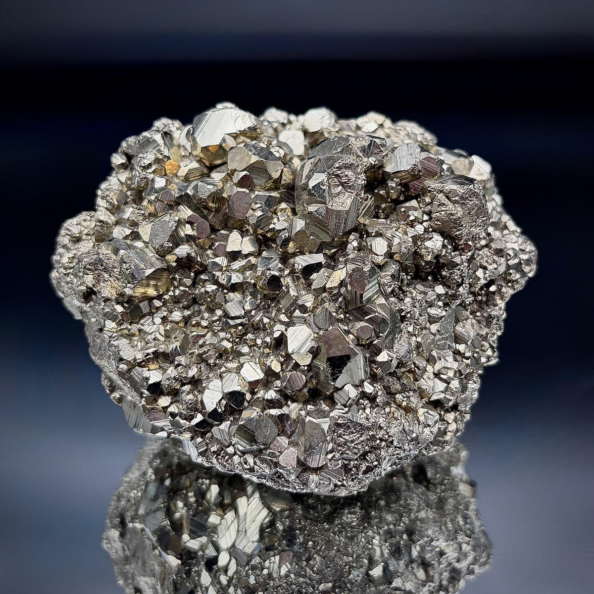 Natural Pyrite crystals in a Peruvian mineral cluster.