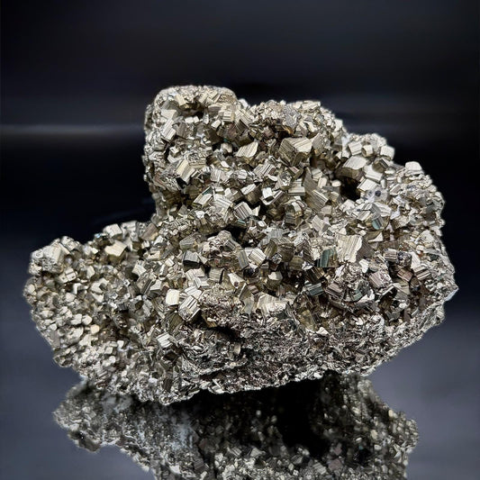 Natural Peruvian Pyrite mineral specimen featuring distinctive metallic crystal formations and individual geological character.