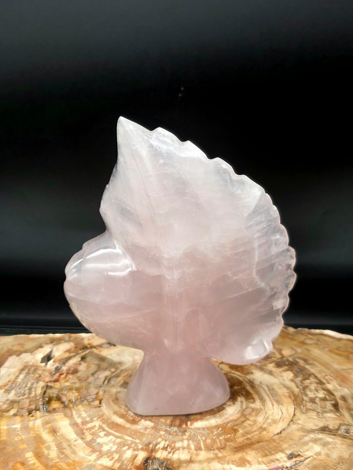 Natural Rose Quartz crystal leaf sculpture hand carved in Madagascar.