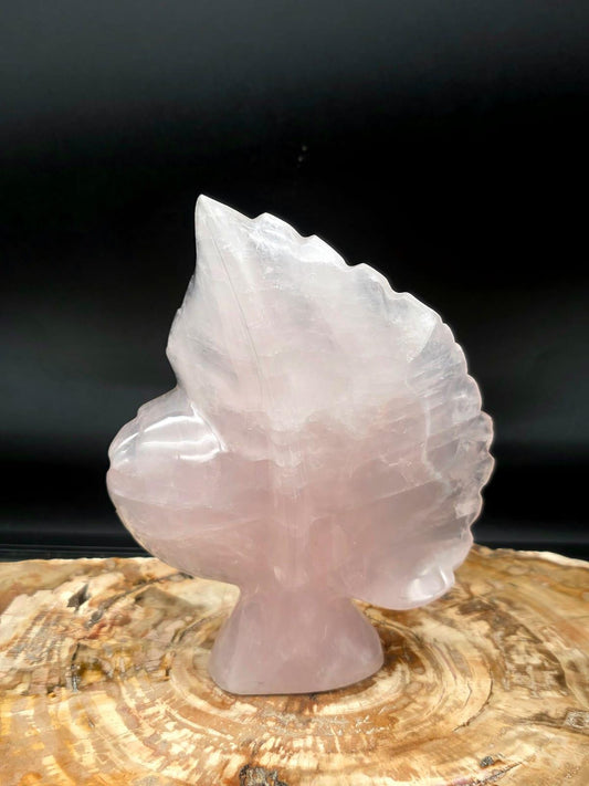 Natural Rose Quartz crystal leaf sculpture hand carved in Madagascar.