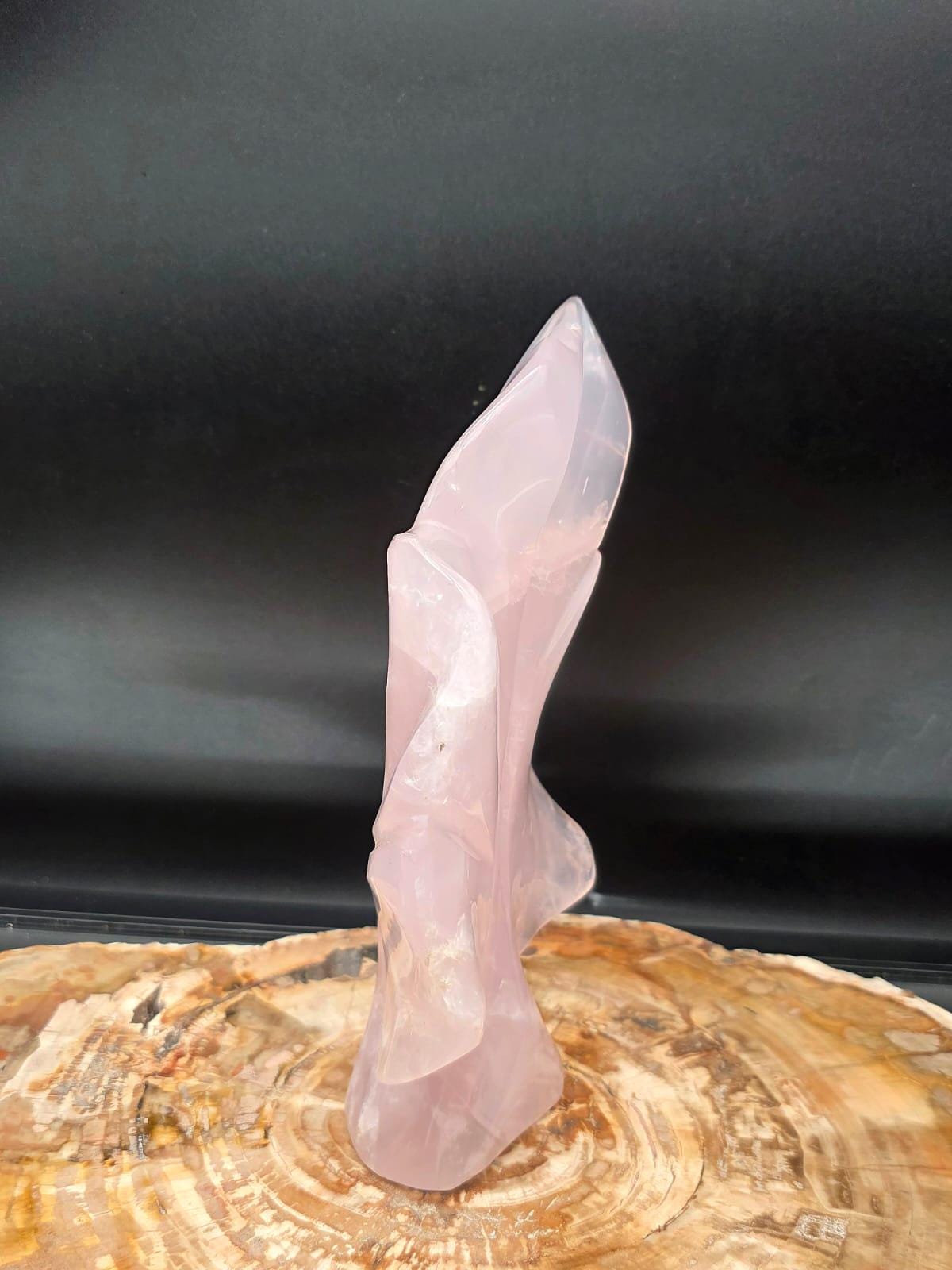 Genuine Madagascan Rose Quartz carved into a freestanding leaf.