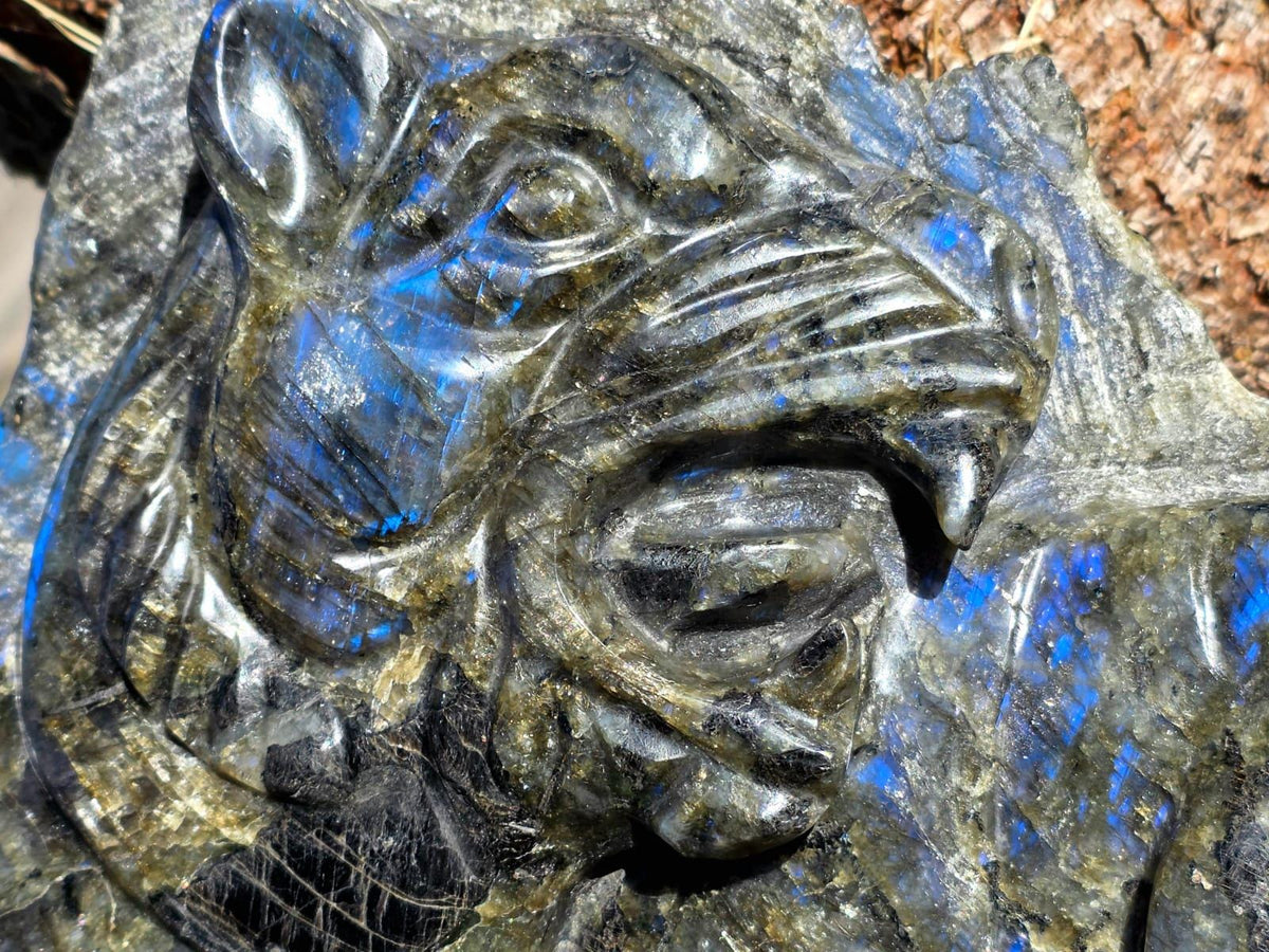 One of a kind natural stone Jaguar sculpture carved from Labradorite