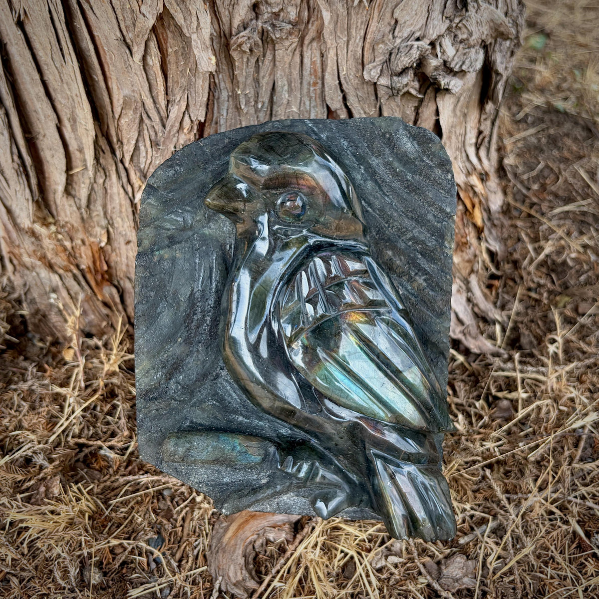 Natural stone songbird sculpture measuring 17cm high