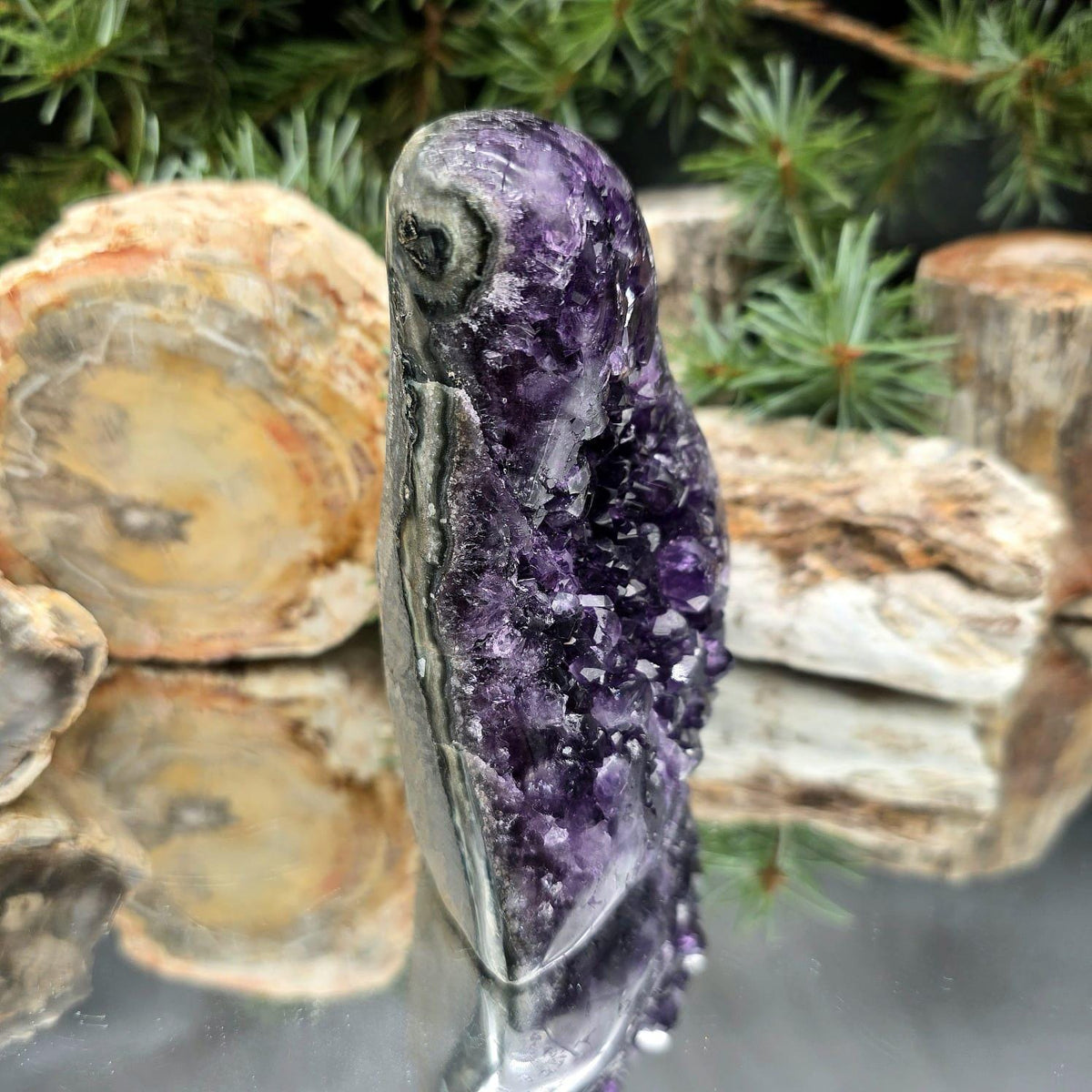 Natural Amethyst mineral specimen originating from Uruguay.