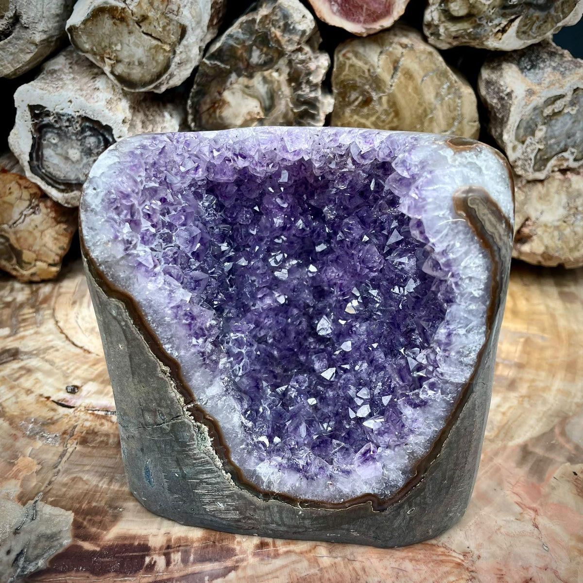 Natural Uruguayan Amethyst crystal geode with cut base