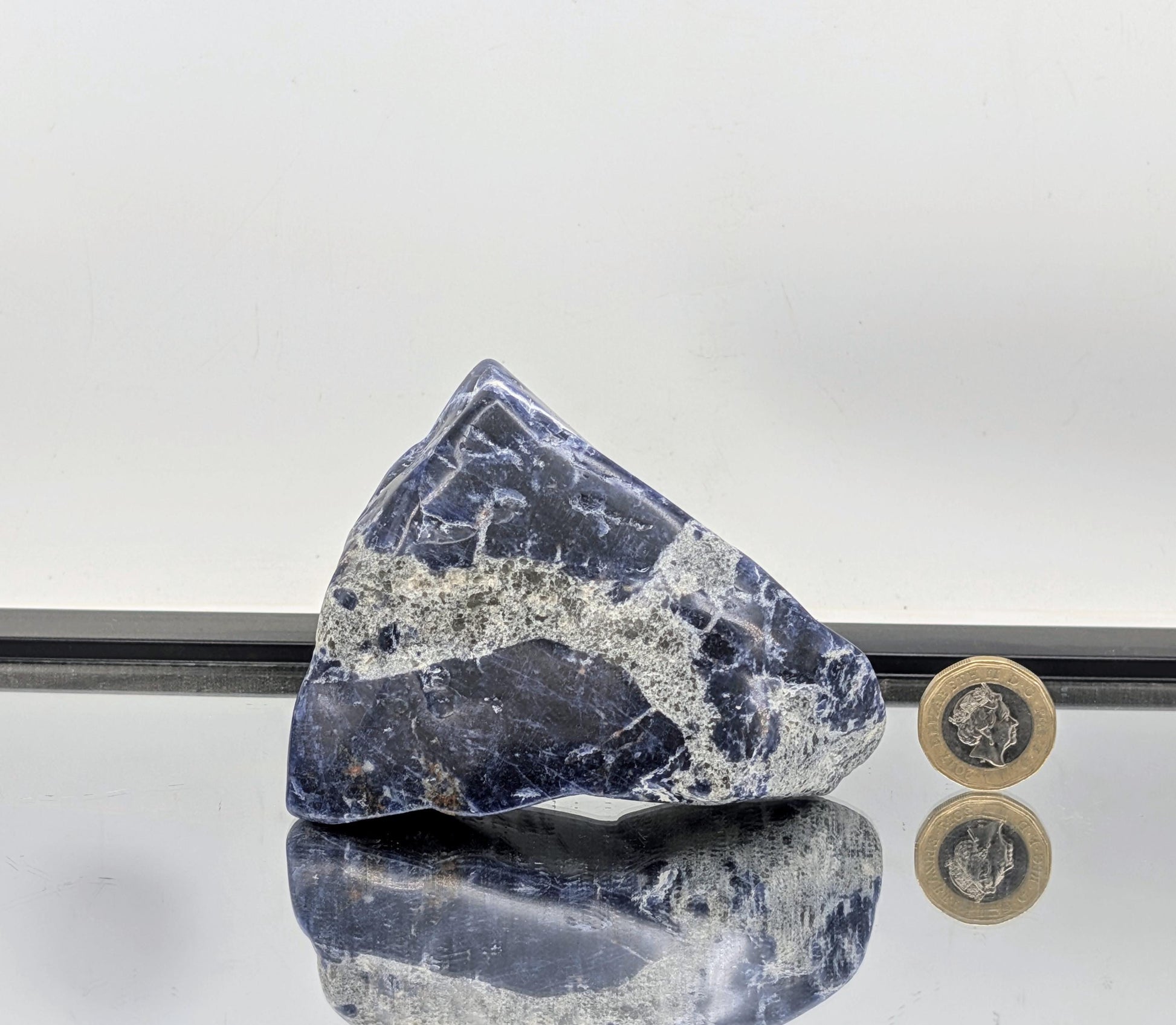 One-of-a-kind large Sodalite crystal freeform with rich patterns.