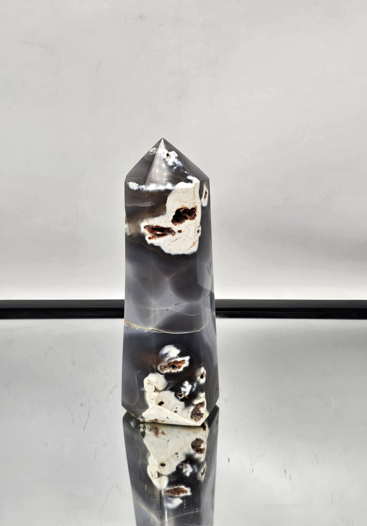 Blue and white Orca Agate tower, hand-carved for home decor.