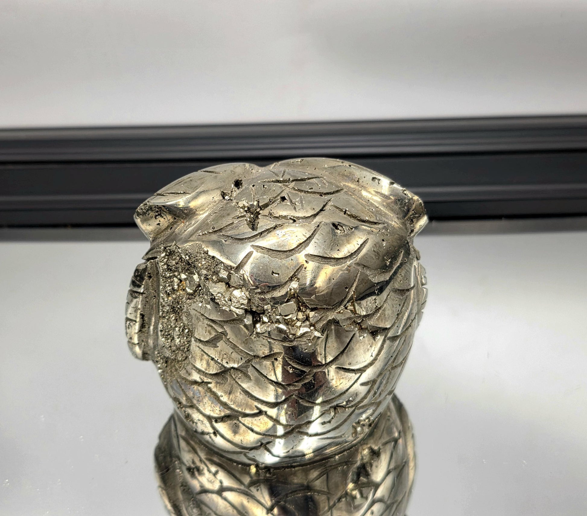 Artisan pyrite owl figure with metallic luster