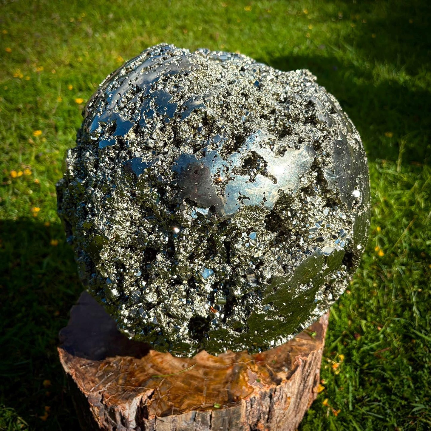 High-end Peruvian Pyrite sphere displayed as a natural mineral feature in a luxury space.