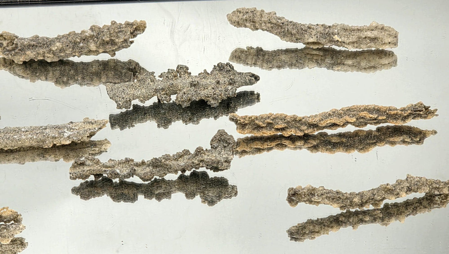 Petrified lightning Fulgurite specimen showing glassy texture