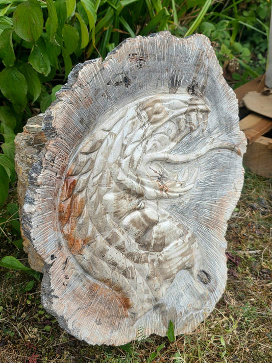 Large hand-carved petrified wood cobra snake sculpture